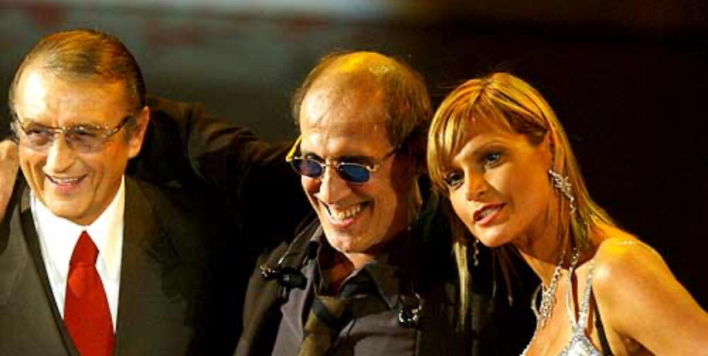 tony renis, adriano celentano e simona ventura sul palco dell'ariston durante la finale nel 2010